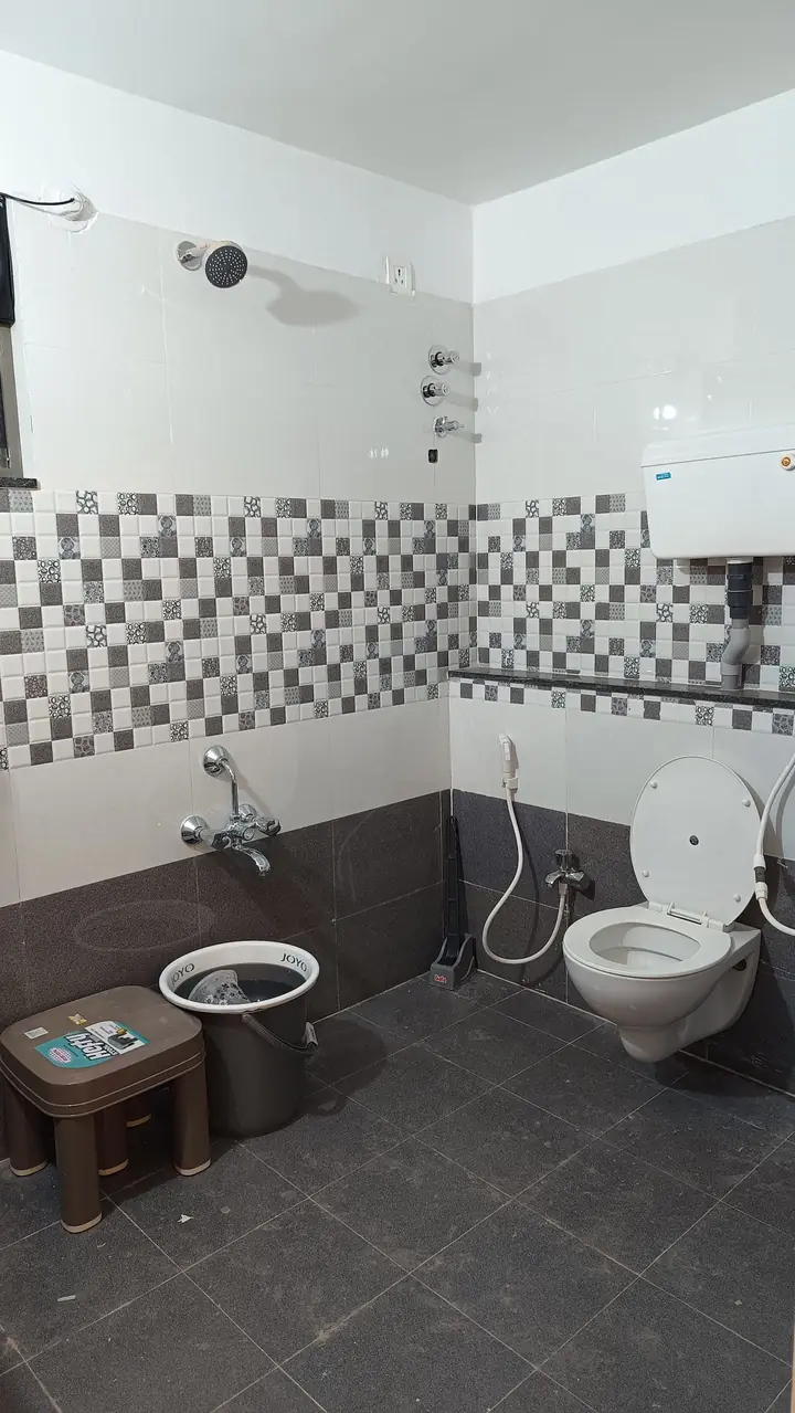 Bathroom with shower and water heater